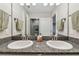 Spacious bathroom featuring granite countertops, double sinks, white cabinets, and modern fixtures at 13118 Rain Lily Dr, Riverview, FL 33579