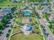 Aerial view showcasing the community park with a playground, common area, and inviting gazebo at 13118 Rain Lily Dr, Riverview, FL 33579