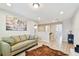 Bright and airy loft area with modern decor, stylish flooring, and comfortable seating at 13118 Rain Lily Dr, Riverview, FL 33579