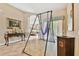 View of open living space with a large hammock frame and unique decorative touches at 15135 Azra Dr, Odessa, FL 33556