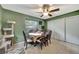 Comfortable dining area featuring a ceiling fan, neutral tile flooring and ample space for Gathering gatherings at 1524 Essex N Dr, St Petersburg, FL 33710