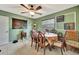 Inviting dining room featuring an ornamental ceiling fan and space for a variety of gatherings at 1524 Essex N Dr, St Petersburg, FL 33710