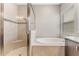 Modern bathroom with separate shower and tub at 15528 Corona Del Mar Dr, Wimauma, FL 33598