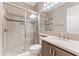 Bathroom with a shower, and a sliding glass door, and a single sink at 15528 Corona Del Mar Dr, Wimauma, FL 33598