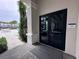 Entrance to the fitness center, visible pool area beyond, and a welcoming entryway at 15528 Corona Del Mar Dr, Wimauma, FL 33598