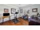 Bright exercise room with natural light features exercise equipment, desk and decor for a functional workout space at 1617 El Pardo Dr, Trinity, FL 34655