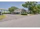 A well-maintained townhome complex with covered parking at 1710 Belleair Forest Dr # A, Belleair, FL 33756