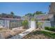 Patio area with a gate and access to community features at 1710 Belleair Forest Dr # A, Belleair, FL 33756