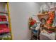 A storage area filled with seasonal decorations and organizers at 1710 Belleair Forest Dr # A, Belleair, FL 33756