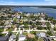Scenic neighborhood aerial view showcasing waterfront community and lush green landscape at 1851 Oklahoma Ne Ave, St Petersburg, FL 33703