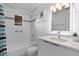 Bathroom featuring a bathtub, shower, and vanity at 1851 Oklahoma Ne Ave, St Petersburg, FL 33703