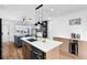 Contemporary kitchen with a large island, stylish lighting, and modern fixtures at 1851 Oklahoma Ne Ave, St Petersburg, FL 33703