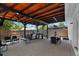 Outdoor space with a covered patio with a grill, outdoor kitchen and dining furniture on the brick pavers at 1851 Oklahoma Ne Ave, St Petersburg, FL 33703
