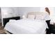 Well-appointed bedroom with a plush bed and stylish decor creating a welcoming atmosphere at 18581 Lake Worth Blvd, Port Charlotte, FL 33948