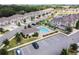 Aerial view of the Montclair Lake community pool with lush landscaping and resident parking at 1962 Marlington Way, Clearwater, FL 33763