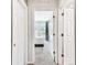 Hallway view of the bedrooms, showcasing natural light and an airy feel at 1962 Marlington Way, Clearwater, FL 33763