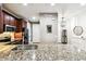 Beautiful kitchen featuring granite countertops and modern stainless steel appliances at 1962 Marlington Way, Clearwater, FL 33763
