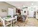 Open floor plan showcasing the kitchen, dining area and breakfast bar seating at 1962 Marlington Way, Clearwater, FL 33763