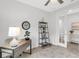 Bright home office, with a desk, bookshelf and a cozy atmosphere at 19652 Ship Wheel Way, Land O Lakes, FL 34638