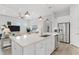 Bright kitchen featuring a center island, stainless steel appliances, and an open design at 19652 Ship Wheel Way, Land O Lakes, FL 34638