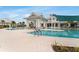 Beautiful pool area with a covered bar and plenty of seating for relaxing and socializing at 19652 Ship Wheel Way, Land O Lakes, FL 34638