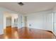 Bedroom with hardwood floors adjacent to the ensuite bathroom at 2138 Viola Dr, Clearwater, FL 33764