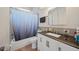Bathroom with a shower, tub, toilet, and vanity, offering a functional and clean space at 2426 17Th N Ave, St Petersburg, FL 33713