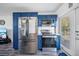 Modern kitchen features stainless steel appliances and contrasting blue cabinetry at 2426 17Th N Ave, St Petersburg, FL 33713