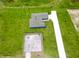 Aerial view of home featuring an extended driveway, large yard, and fenced-in area for outdoor activities at 2426 Hiers Rd, Dover, FL 33527