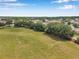 Aerial view of a meticulously maintained soccer field ready for sporting events at 3230 Bellericay Ln, Land O Lakes, FL 34638