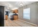 Open kitchen featuring wood cabinets and stainless appliances at 3230 Bellericay Ln, Land O Lakes, FL 34638