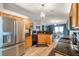 Well-equipped kitchen featuring modern appliances, granite countertops, and ample cabinet space at 3230 Bellericay Ln, Land O Lakes, FL 34638
