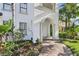 Elegant arched entrance with decorative columns leading to a welcoming home at 3404 W Sevilla St, Tampa, FL 33629