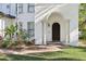 Inviting front entrance with arched columns and manicured landscaping at 3404 W Sevilla St, Tampa, FL 33629
