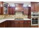 Modern kitchen featuring stainless steel appliances and ample storage space at 3404 W Sevilla St, Tampa, FL 33629