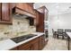 Gourmet kitchen with stainless steel appliances and breakfast nook at 3404 W Sevilla St, Tampa, FL 33629