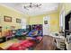 Bright and cheerful playroom with colorful decor, comfortable seating, and plenty of space for activities at 3404 W Sevilla St, Tampa, FL 33629