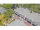 Aerial view of real estate townhomes showing two car garages, brick roads, and well-kept landscaping at 350 2Nd N St # 1, St Petersburg, FL 33701