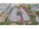 Aerial view of community, Huntington Unit #1, and a gated entrance illustrating the controlled access to the residences at 350 2Nd N St # 1, St Petersburg, FL 33701