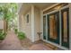 Inviting entrance with brick walkway leading to a green double door entrance at 350 2Nd N St # 1, St Petersburg, FL 33701