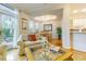 Open-concept living area with access to the patio, flowing into the dining room at 350 2Nd N St # 1, St Petersburg, FL 33701