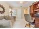 Inviting home office featuring a desk area, comfortable sofa, and soft natural lighting at 350 2Nd N St # 1, St Petersburg, FL 33701