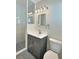 Updated bathroom features modern vanity, stylish fixtures, and tiled walk-in shower at 3701 Manatee Se Dr, St Petersburg, FL 33705