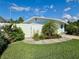 Charming home with a beautifully landscaped front yard, privacy fence, and lovely curb appeal at 3701 Manatee Se Dr, St Petersburg, FL 33705