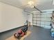 Spacious garage with garage door, equipment, and ample storage space, offering convenience and functionality at 3701 Manatee Se Dr, St Petersburg, FL 33705