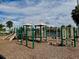 An inviting playground with climbing structures, slides, and soft ground covering for safety and fun at 3701 Manatee Se Dr, St Petersburg, FL 33705