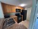 Fully-equipped kitchen with modern appliances, cabinetry, and ample countertop space at 3814 N Lake Dr # 65, Tampa, FL 33614