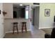Open-concept kitchen with two bar stools, perfect for casual dining and entertaining at 3814 N Lake Dr # 65, Tampa, FL 33614