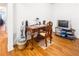 This office features a wood desk, chair, and coordinating floors creating an inviting space at 3866 Mariner Dr, St Petersburg, FL 33705
