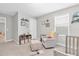 Well-lit Bedroom with comfortable seating, storage, and soothing decor, designed for relaxation and convenience at 4496 Tatum Loop, Odessa, FL 33556